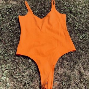 Orange bodysuit
